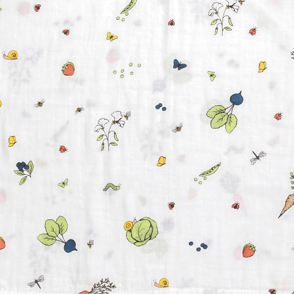 Organic cotton muslin in the garden collection including snail, strawberries and lettuce