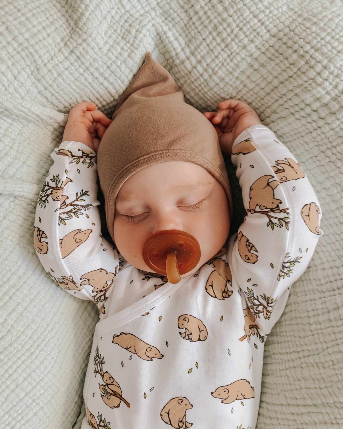 Sleeping baby in bear kimono vest bodysuit