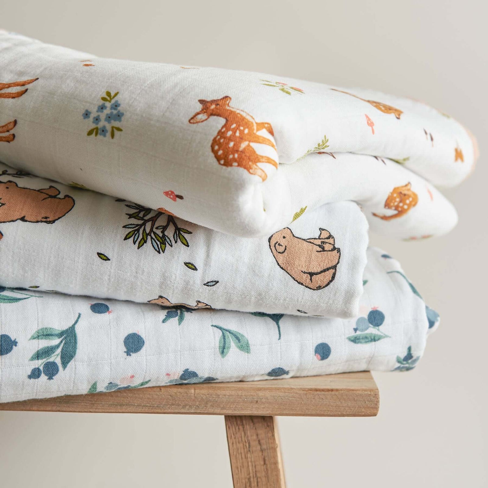 Three folded sets of organic cotton muslin 