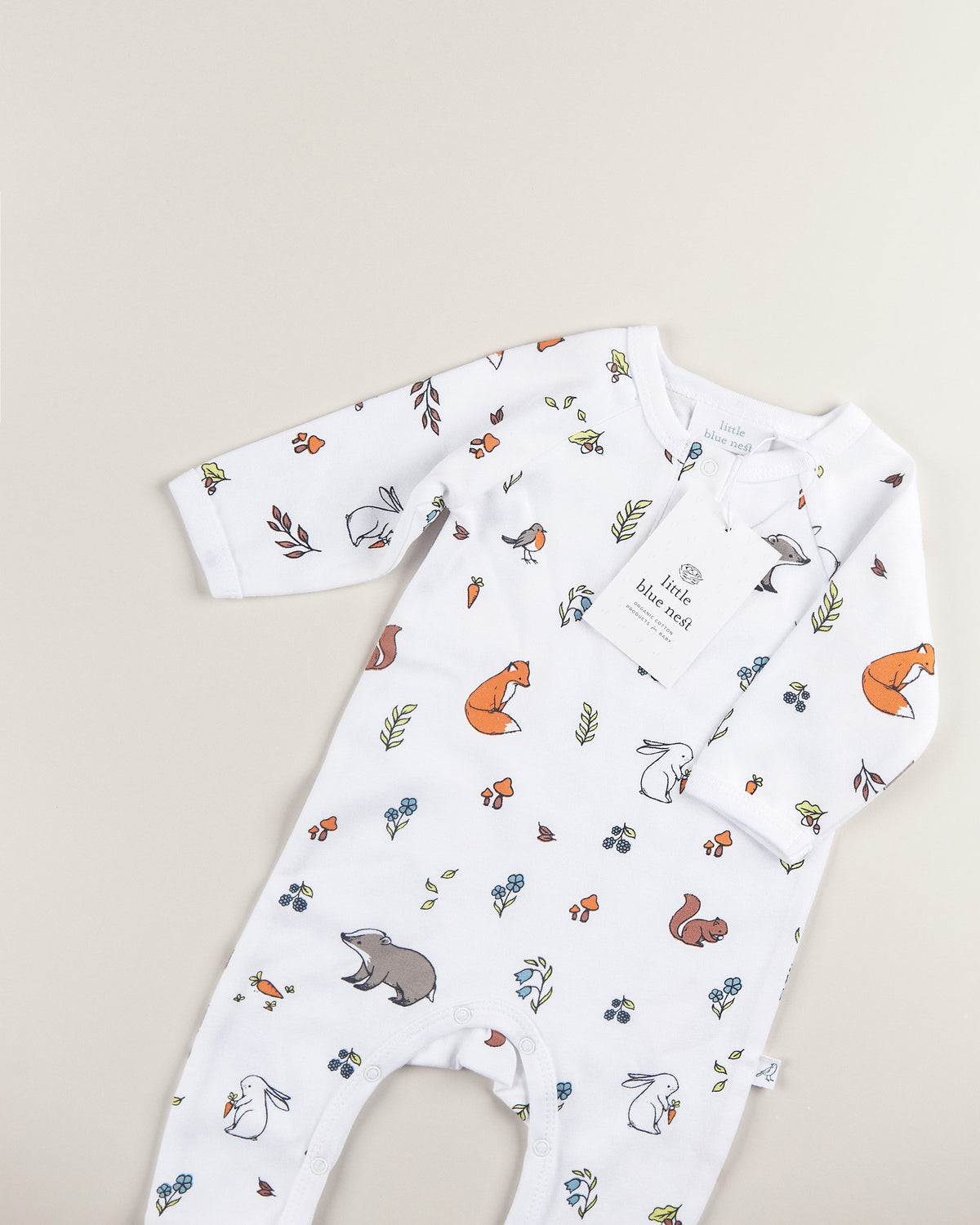 Woodland baby romper with swing tag